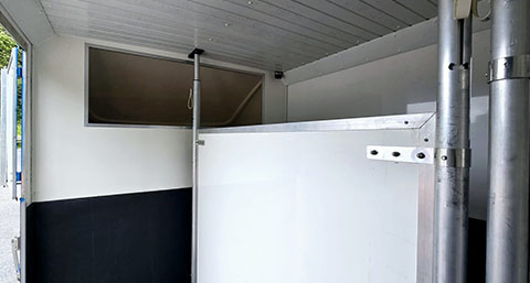 the interior of HCS Horse Transport's horsebox, showcasing the interior features such as a cubby hole